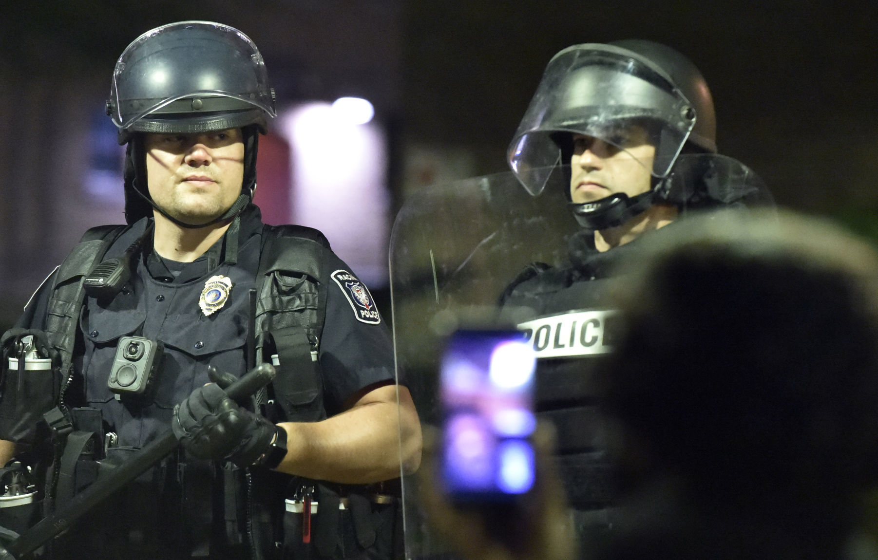 Law enforcement in front of the Racine Police Department
